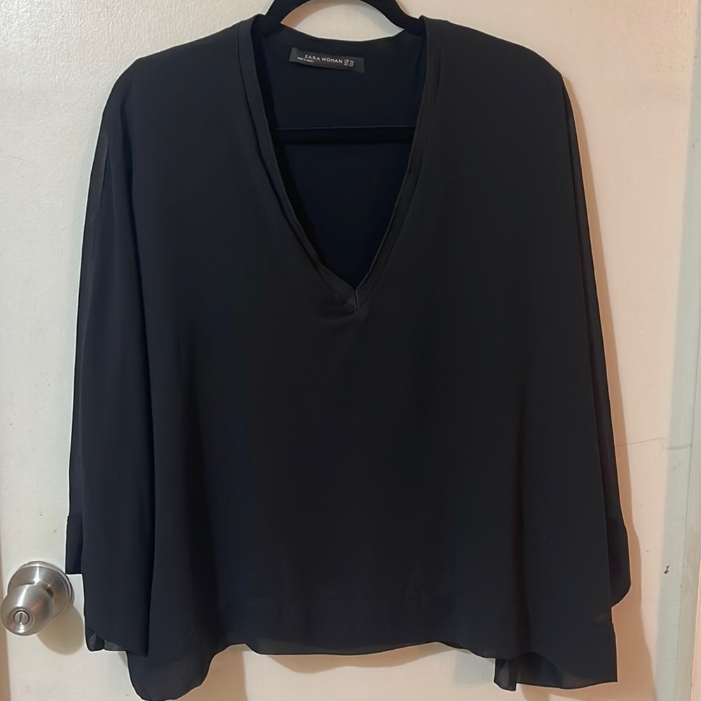 Elegant black ZARA blouse in size XXL.